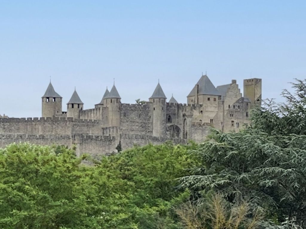 Distant view of the Cité de Carcassonne with the Château Comtal and its square Tour Pinte rising above the ramparts
