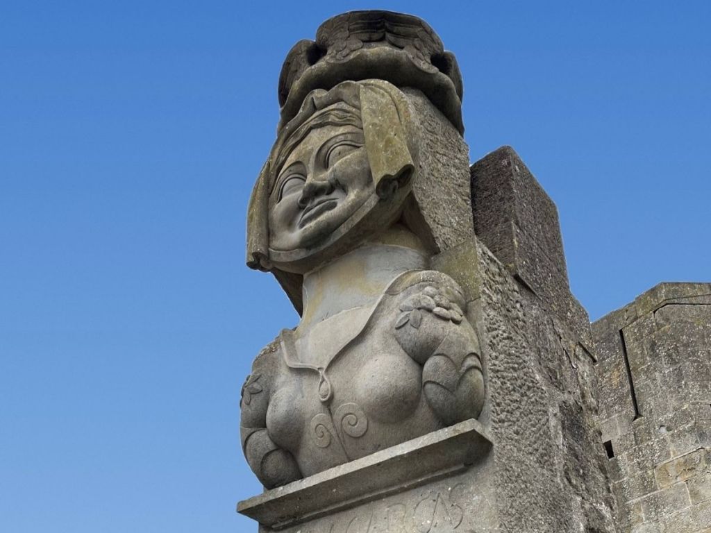 Stone statue of Dame Carcas on the ramparts of Carcassonne