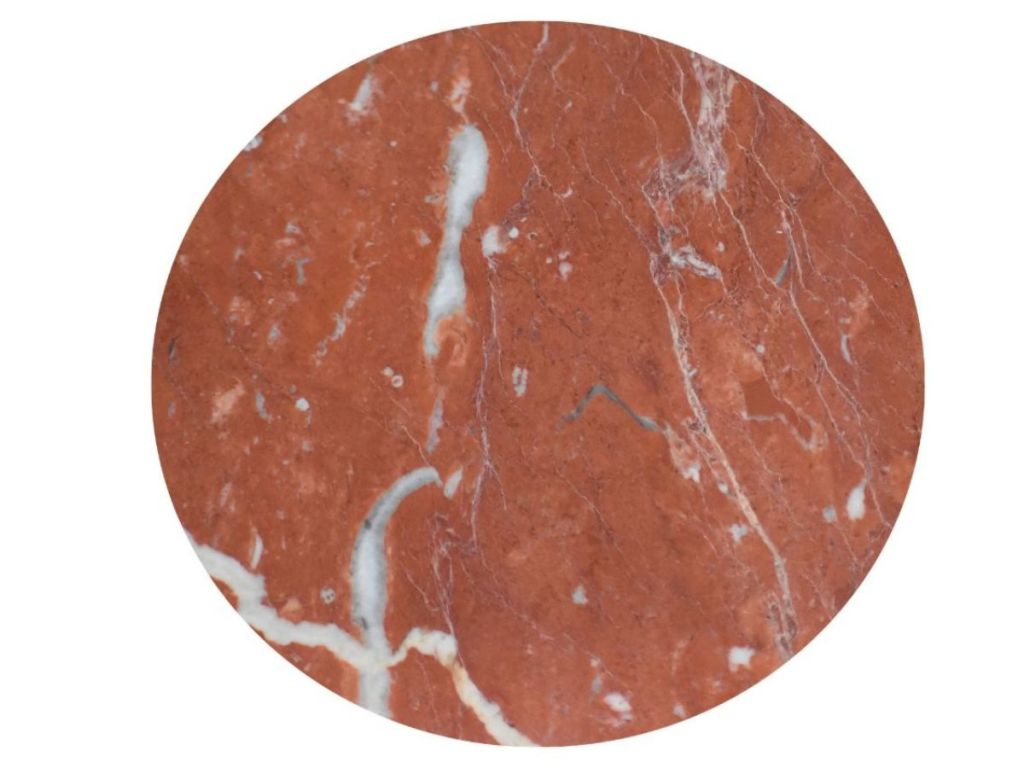 Close-up of red and white veining in Caunes-Minervois incarnat marble