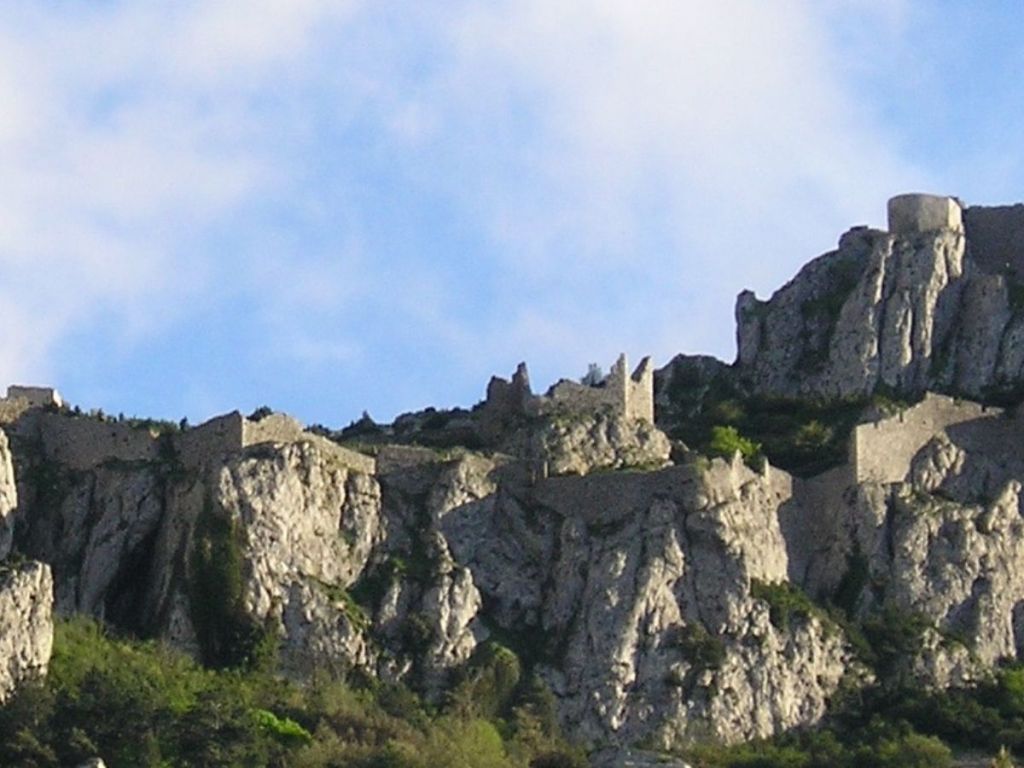 The fortress of Peyrepertuse stretching along a clifftop ridge in the Corbières