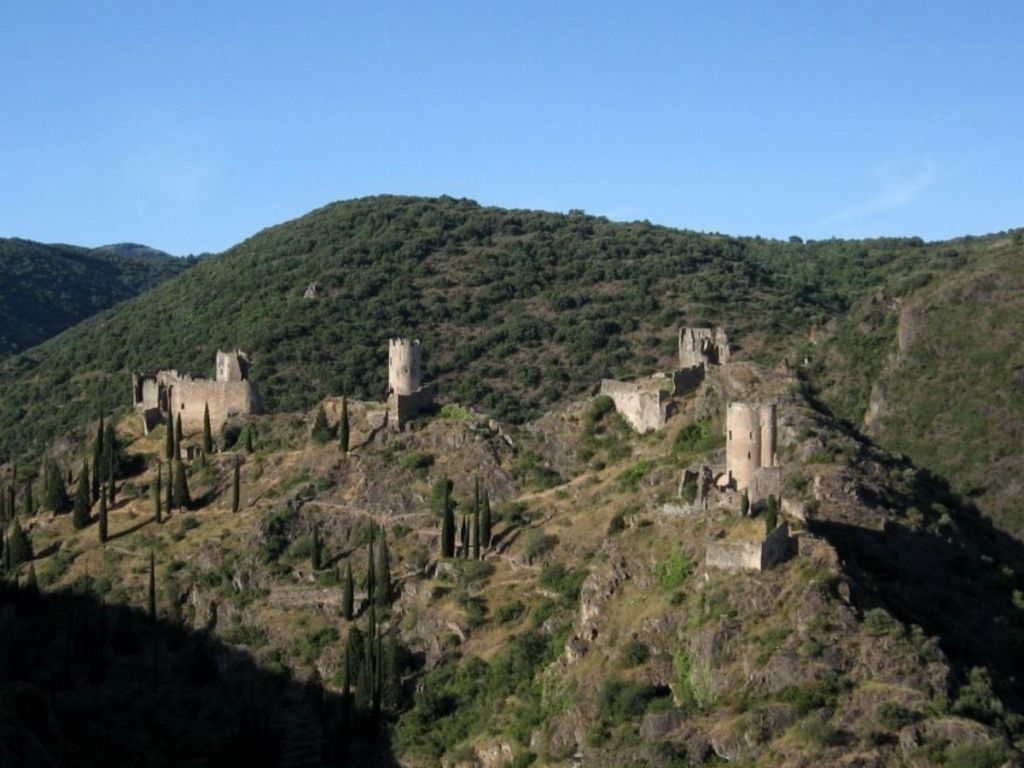 The four medieval castles of Lastours perched on a rocky ridge in the Aude