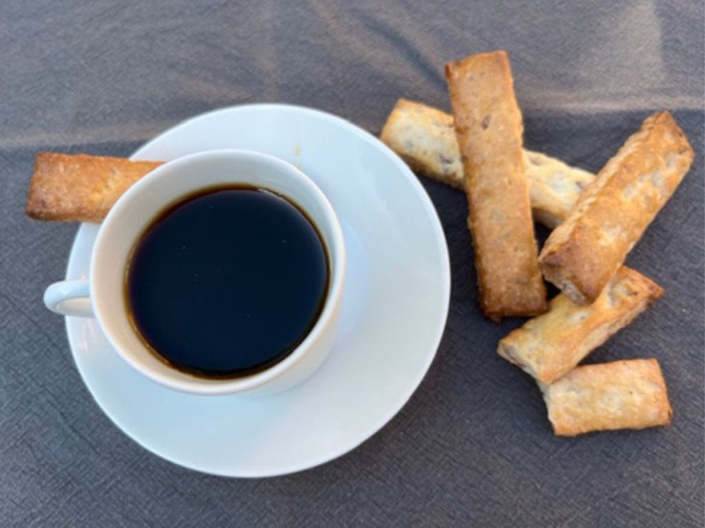 Croquants de Nîmes and a cup of black coffee, seen from above